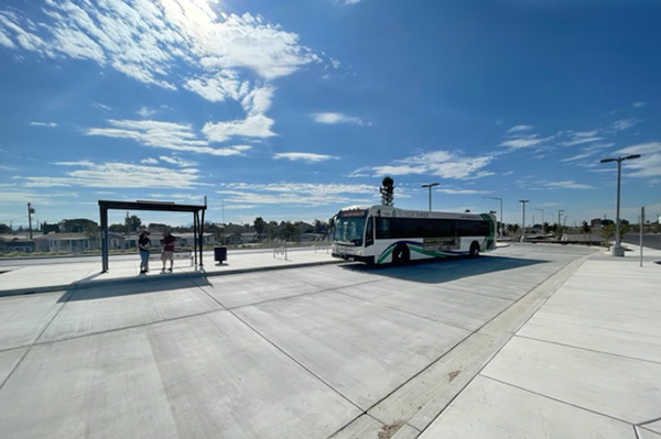 The bus arrives at a park and ride