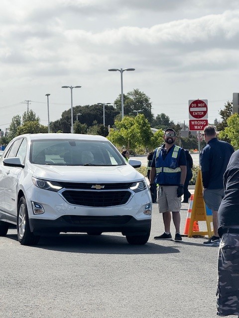 Wil, facilities, with car at Shred It 2025